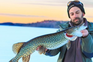 Ice fishing for pike, zander and perch in Sweden.